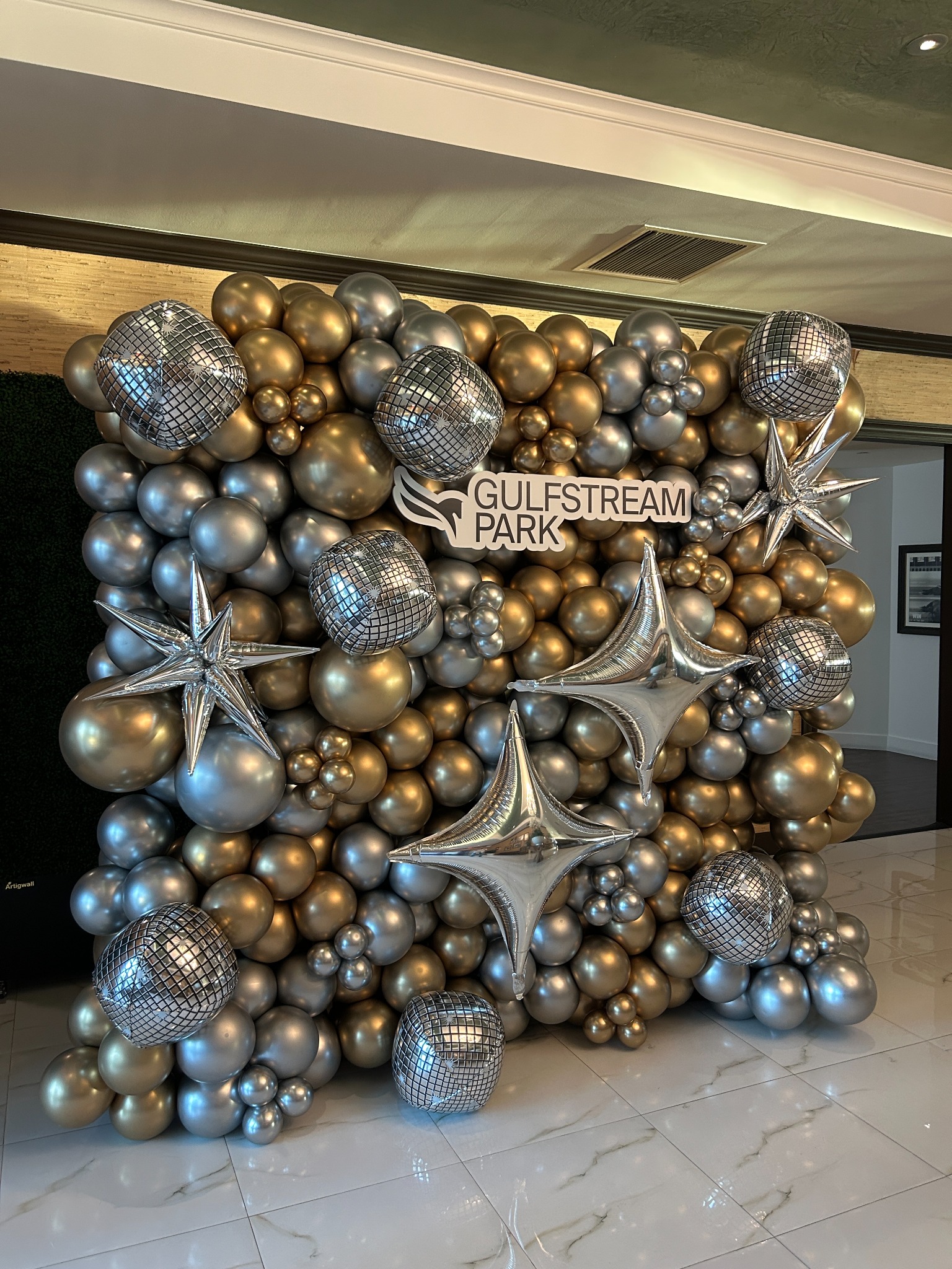 Branded Gulfstream Park metallic balloon wall by The Event Edit