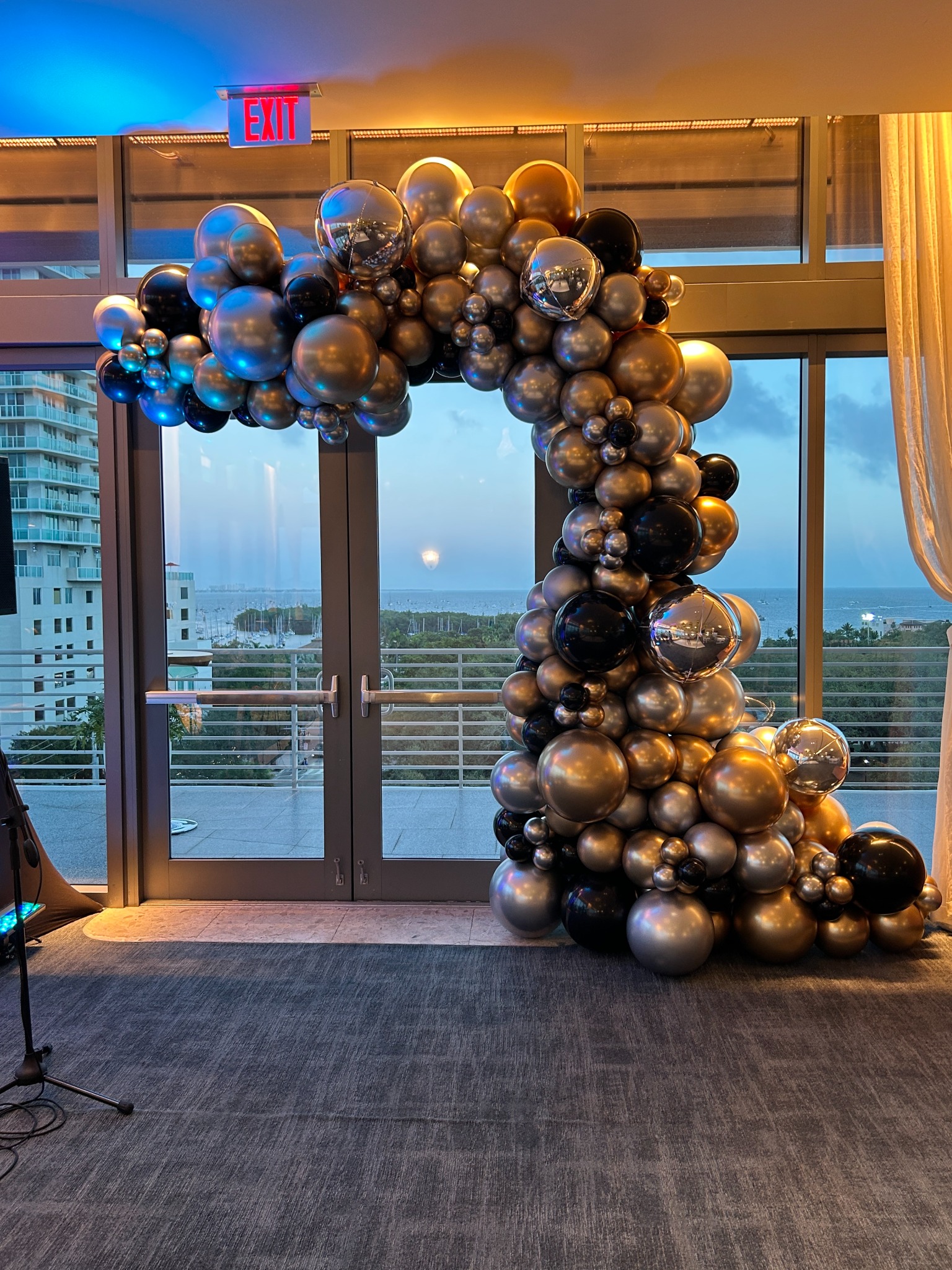 Metallic corporate entrance balloon garland by The Event Edit